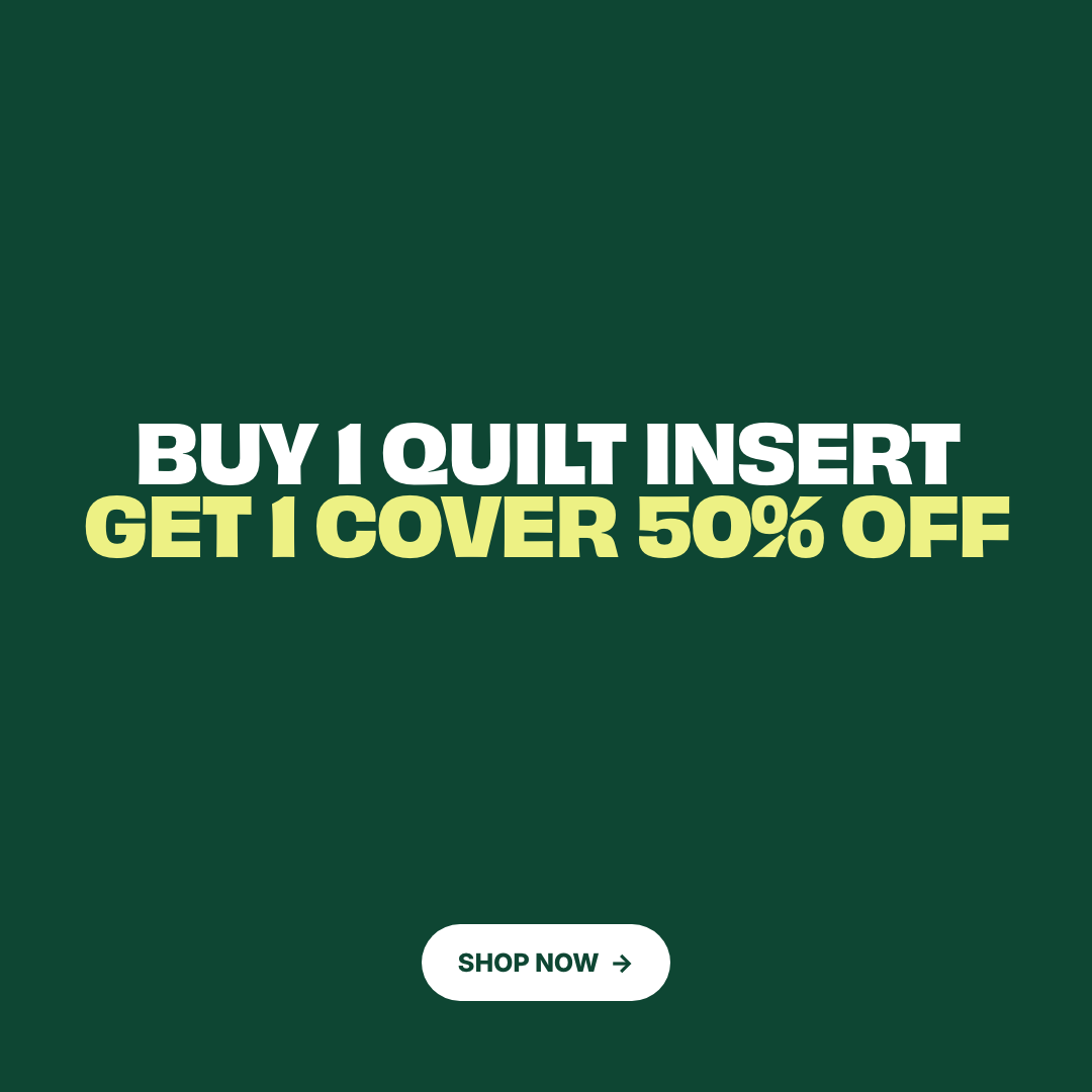 Promotional graphic on a dark green background with the text 'BUY 1 QUILT INSERT GET 1 COVER 50% OFF' in white and yellow, plus a white 'SHOP NOW' button at the bottom.