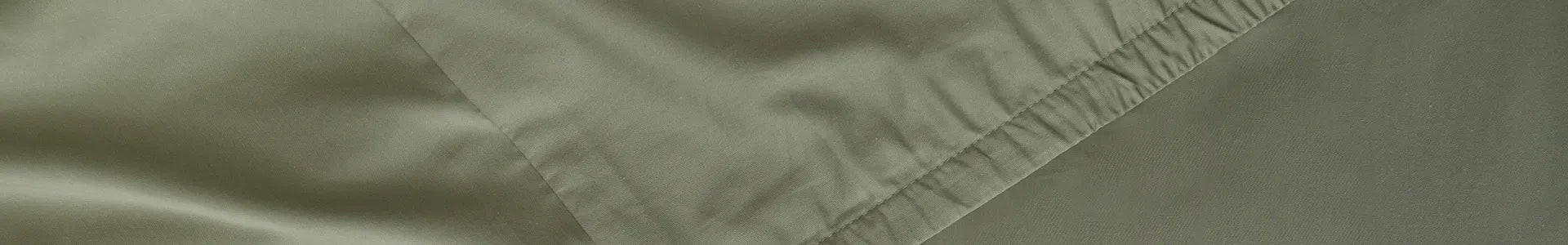 Close-up of a folded piece of fabric with a subtle pattern