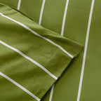 Green fabric with white stripes and a magnetic clip corner.