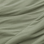 Close-up of green fabric with a slight texture