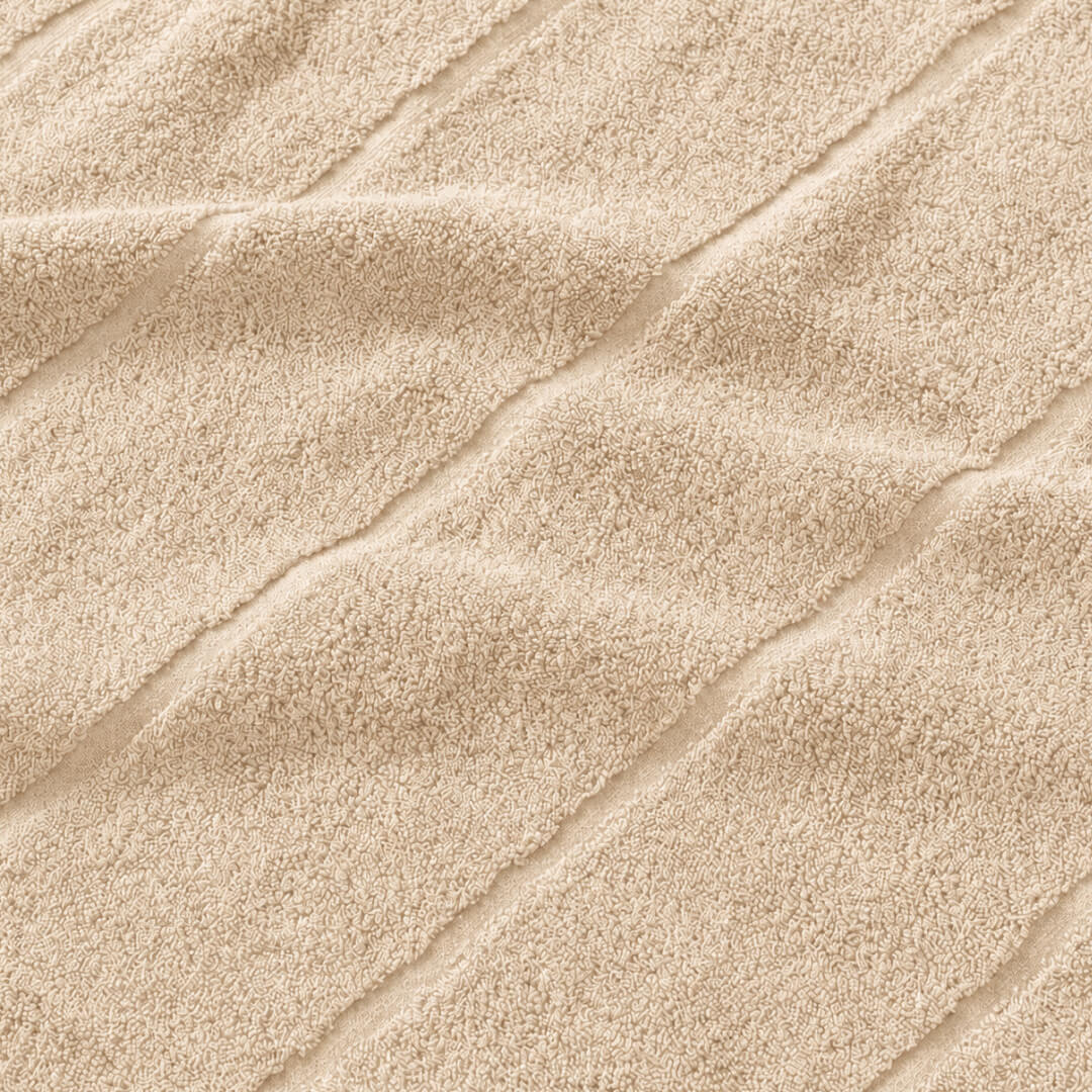 Beige bath towel zoomed in 