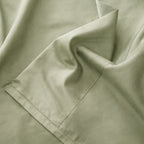 Close-up of beige fabric with a folded edge.