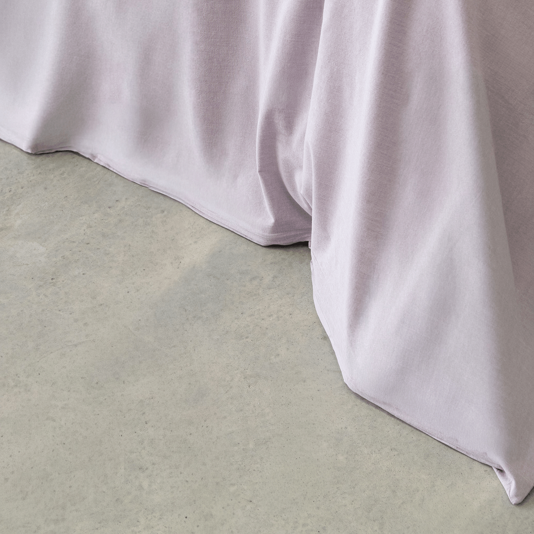 Close-up of the Daylesford quilt cover showcasing the soft fabric drape and neatly finished hem.