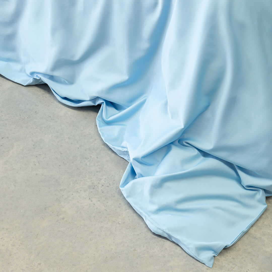 Pastel blue quilt cover material.