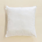 White European pillow on a beige background.