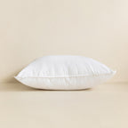 White pillow on a beige background.