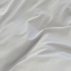 Detailed close-up of smooth gray quilt cover fabric arranged in soft folds and gentle waves.