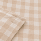 Detailed view of the quilt cover corner ties, showcasing the internal fabric loops designed to secure a quilt insert and prevent shifting.