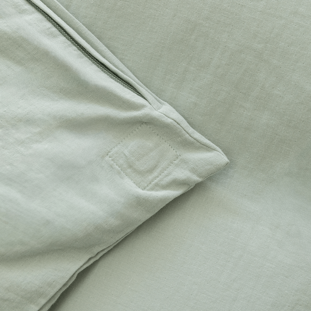 Detailed view of the internal quilt attachment point inside the quilt cover, helping keep the quilt insert securely positioned during use.