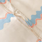Close-up of a duvet cover with pattern and zipper.