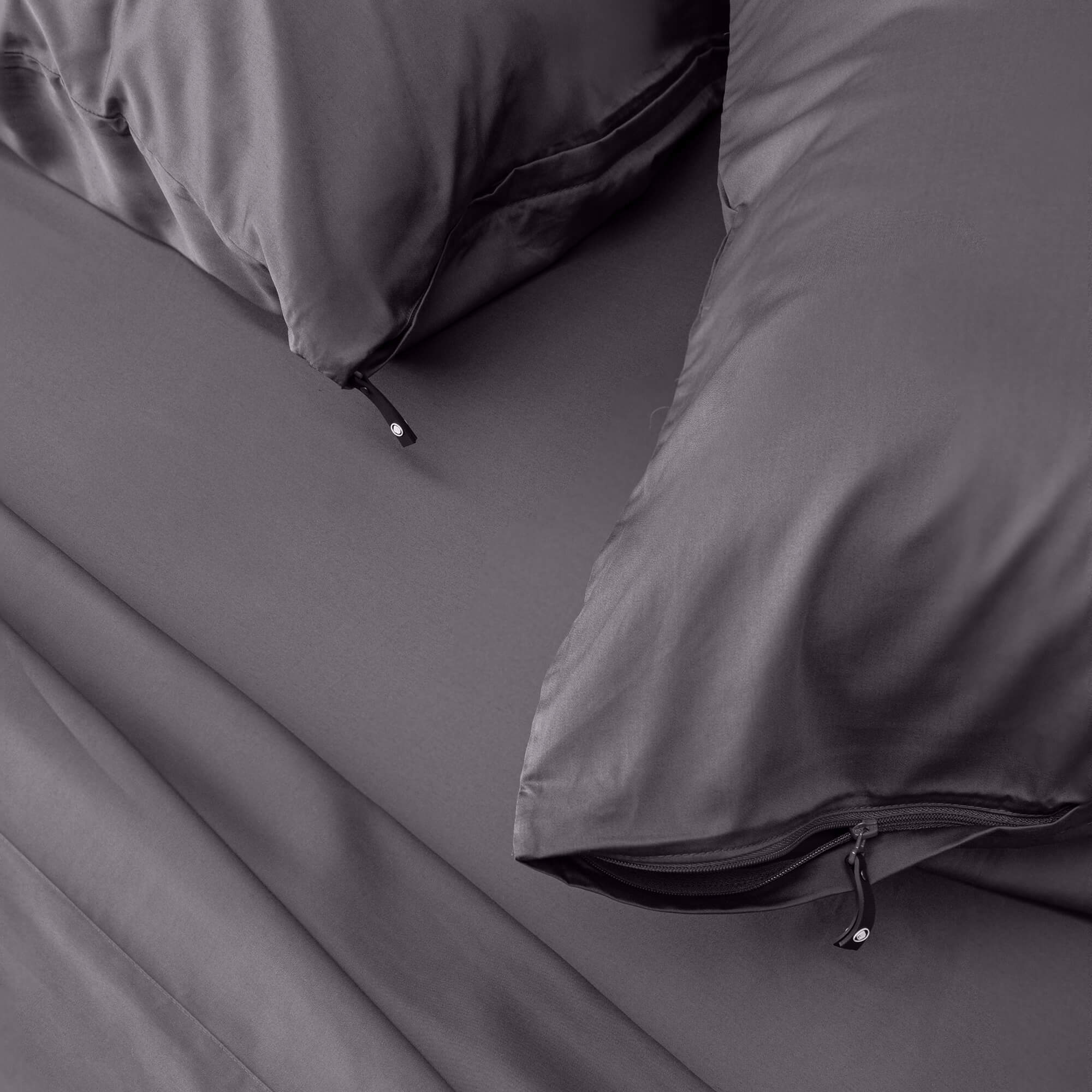 Close up of pillows and pillowcases with zip detail in gray