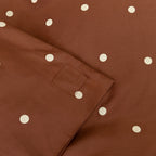 Brown fabric with white polka dots and a magnetic corner clip.