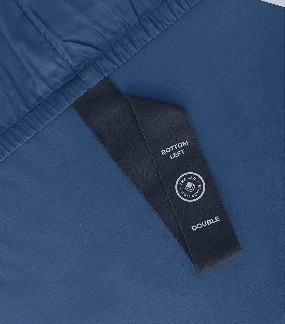 Blue fabric with a black label on a blue background
